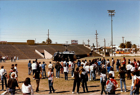 Huey landing at School